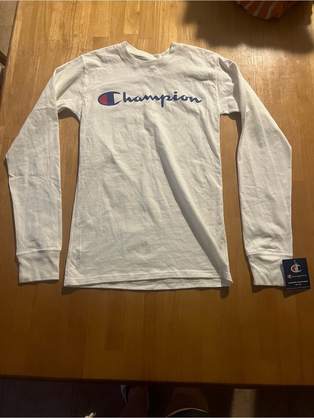 Champion White Tee with Navy & Red Logo Tag